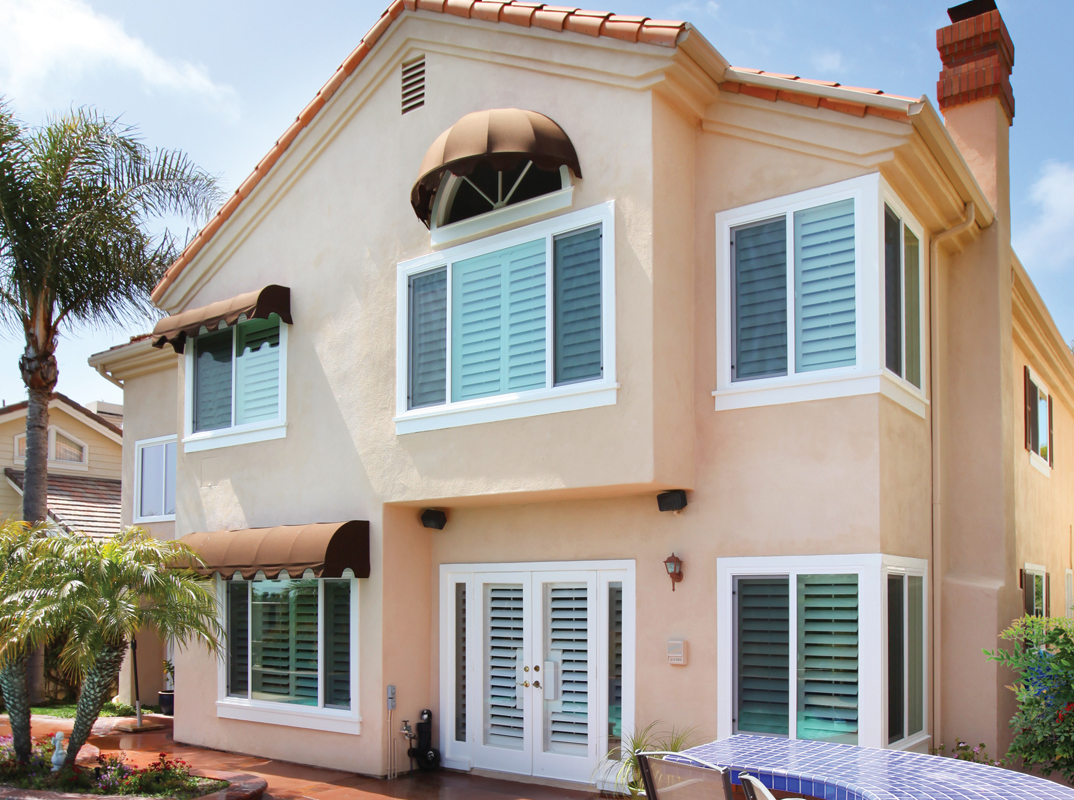 Milgard V250 Doors and windows on a house with a pool